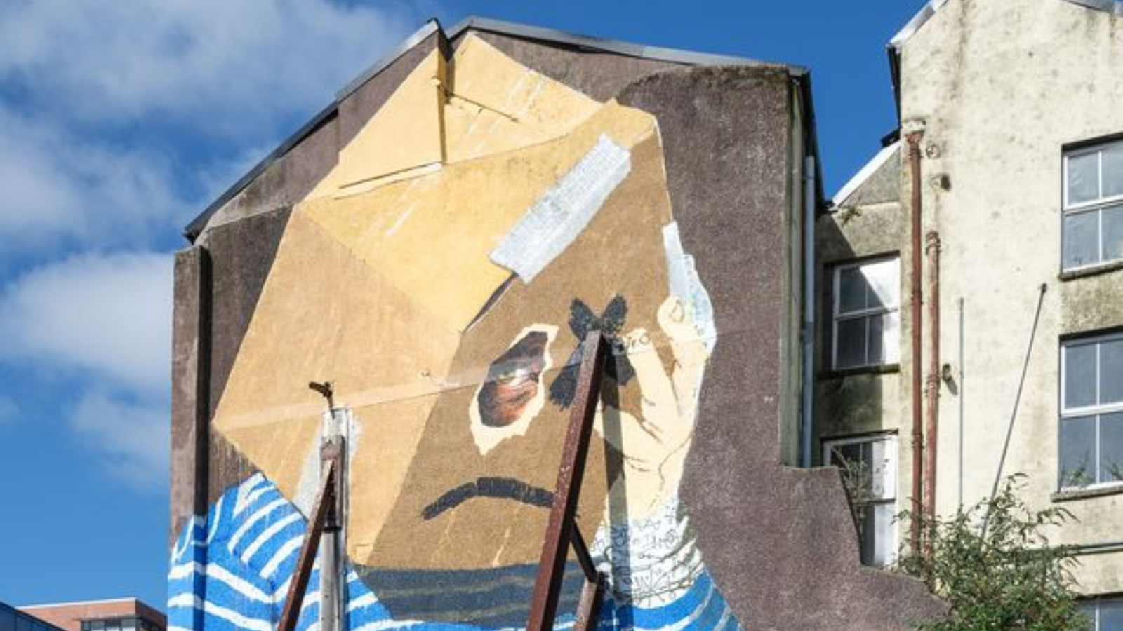 “What is home?” by Street Artist Asbestos on South Main Street Cork